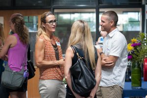 Mrs. Michelle Bradley, Secondary Vice Principal, talks with new parents at the reception.