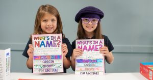 Grade 2 students proudly showing their work
