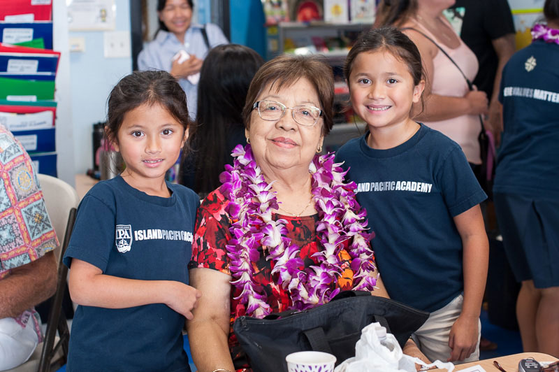 Grandparent and grandchildren in classroom