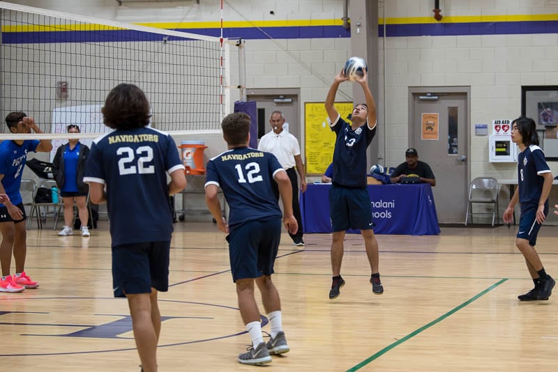 High school boys' varsity volleyball game