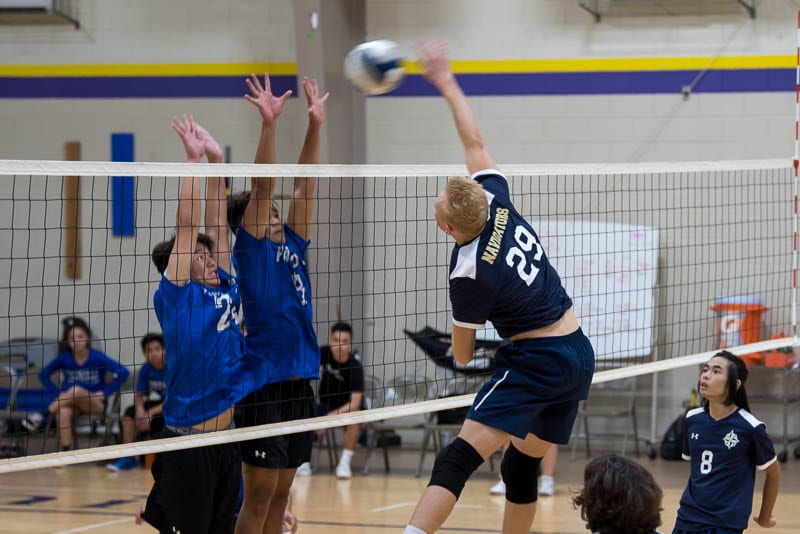 High school boys' varsity volleyball game