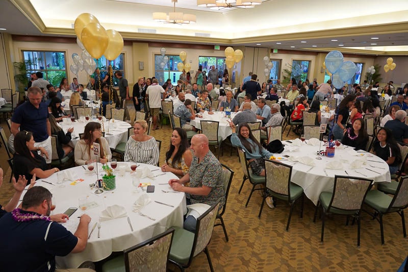 Guests seated at tables in banquet hall