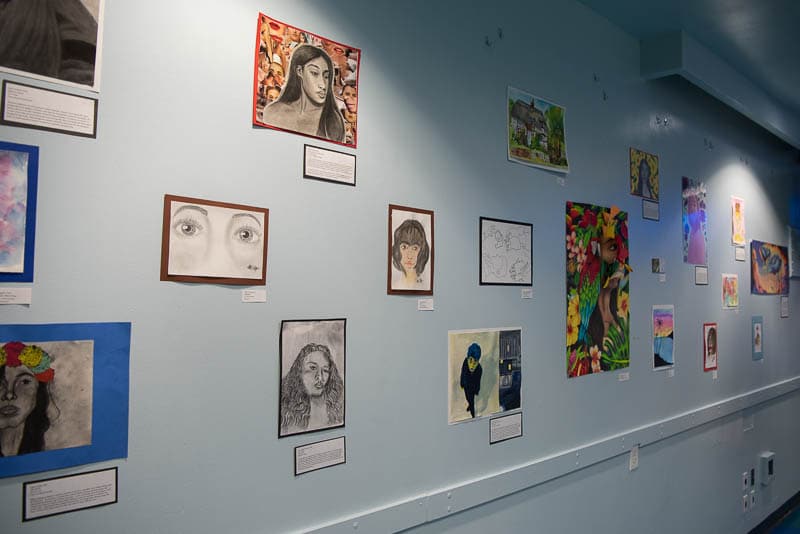 Student artwork displayed on wall