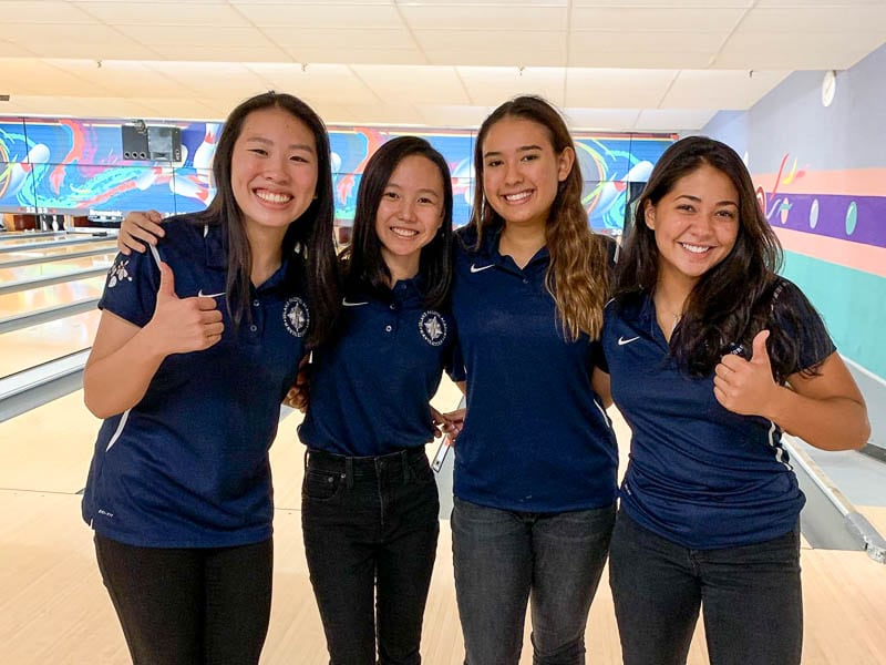 Girls varsity bowlers on the lane