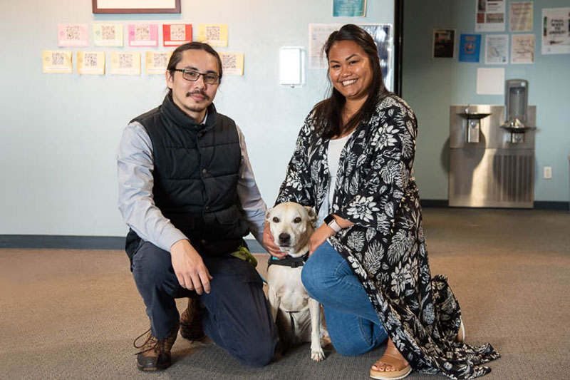 Teachers with therapy dog