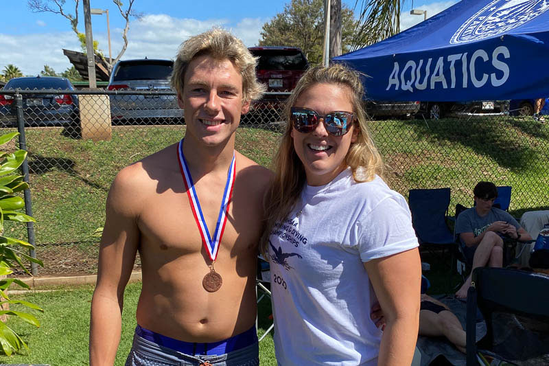 Swimmer with his coach