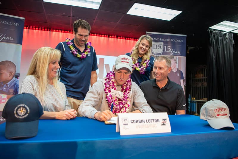 Swimmer signing national letter of intent