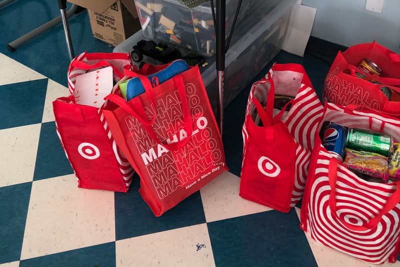 Bags of gifts and donations ready to be delivered to Puʻuhonua O Waiʻanae.
