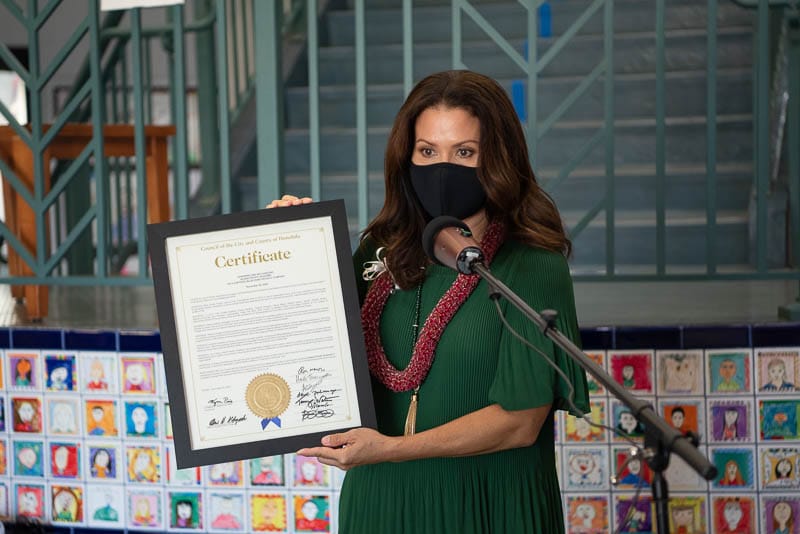 Councilmember Kym Pine shares certificate of proclamation