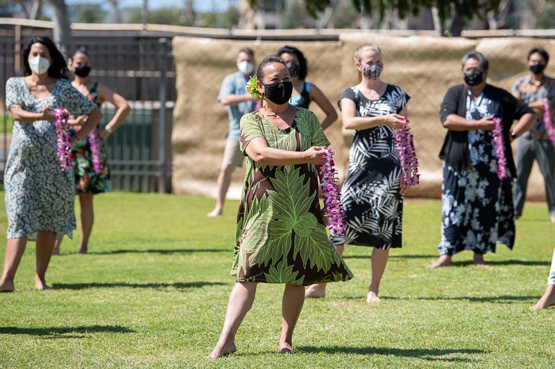 Teachers dancing hula for May Day