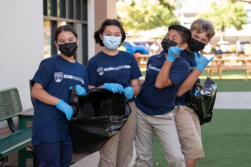 Students cleaning campus