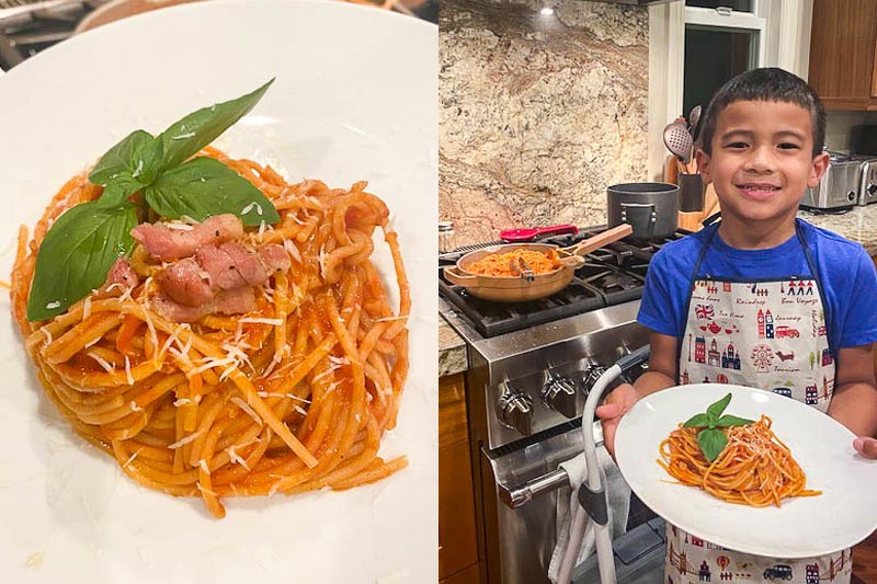 Boy with pasta dish