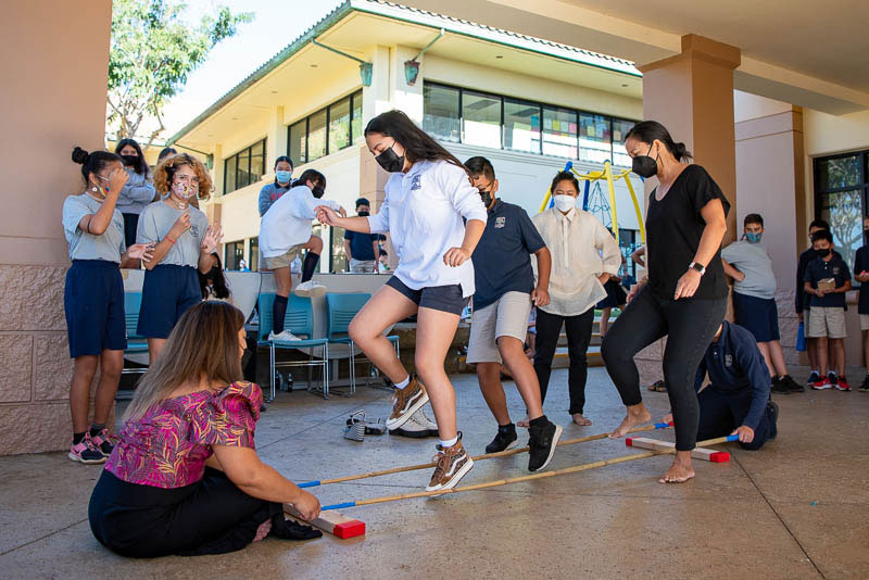 Students doing tinikling dance