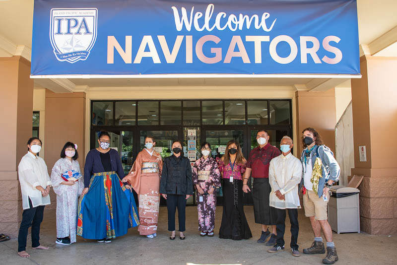 Faculty in cultural attire.