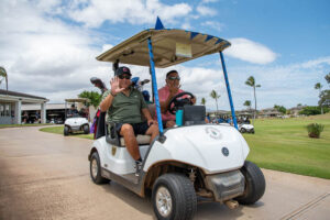 Golfers in golf cart