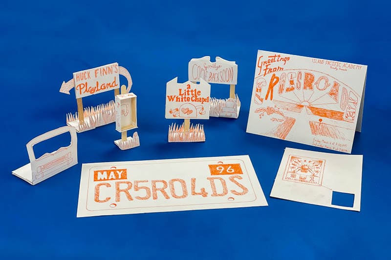 Scale models of sets and signs for play.