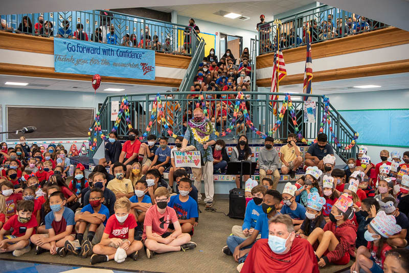 Students at assembly in Elementary foyer.