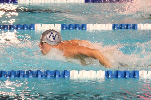 IPA student competitively swimming