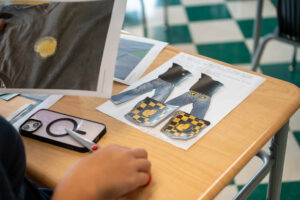 Students working on their designs for The Decades Project.