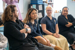 Students discussing their designs for The Decades Project.