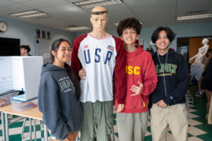 Students working on their designs for The Decades Project.