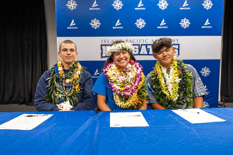 yder Obrero-Ueno '26, Thayleah Hall '26, and Colin Burns '26.