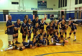 The Island Pacific Academy Intermediate Girls volleyball team after their exciting victory over Hawai'i Mission Academy.