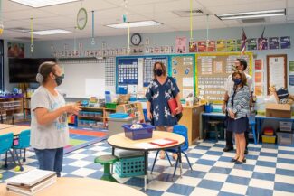 Teddi Anderson tours kindergarten classroom at IPA