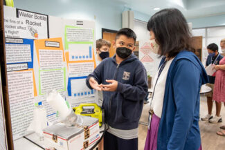 Student presenting science project